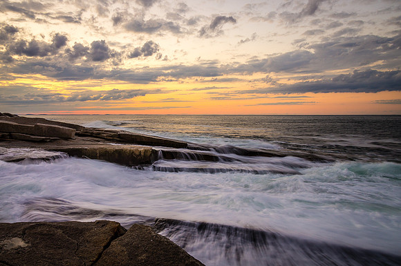 Peaceful Waves on a Rocky Shore